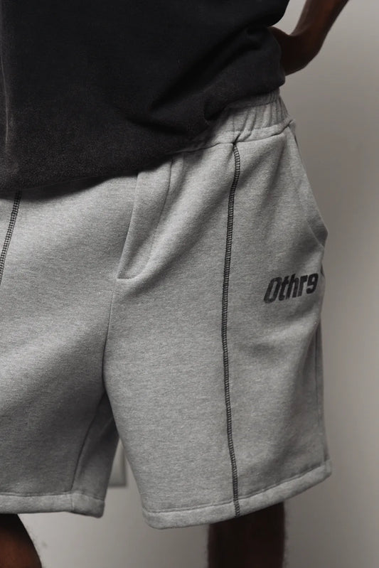 CONCRETE.404 CUT SWEATSHORTS