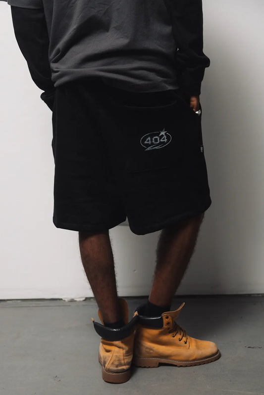 CONCRETE.404 CUT SWEATSHORTS
